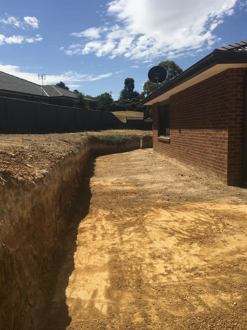 Excavation contractor excavating earth in Central Victoria
