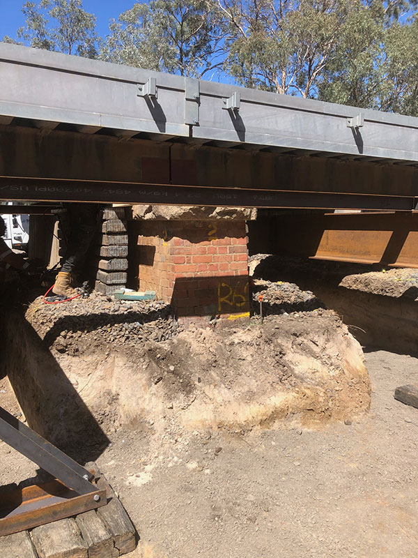 Excavator performing site cuts in Central Victoria