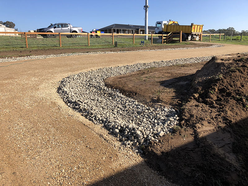 Professional trenching contractors from Australian Trenching & Excavations completing a complex drainage project for a central Victoria property.